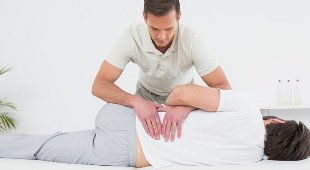 the back pain in the lumbar area massage