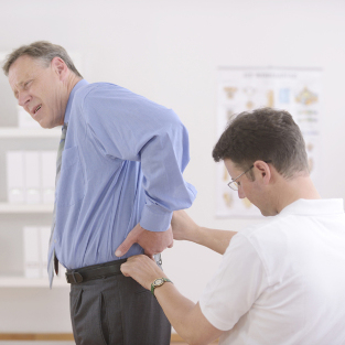 the back pain in the lumbar area treatment
